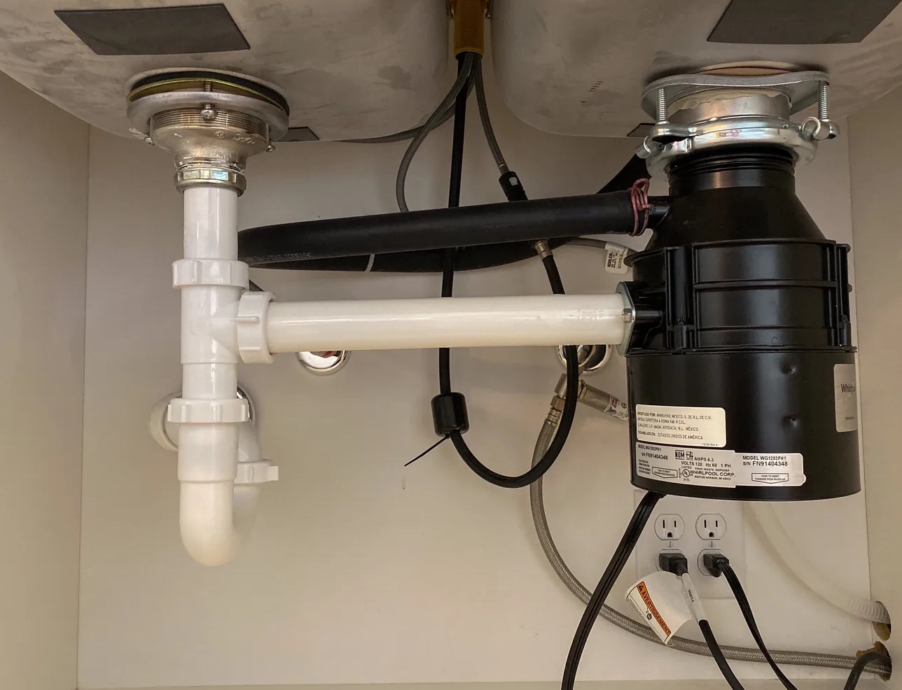 Leaky Garbage Disposal Cleanup in Bellevue, WA